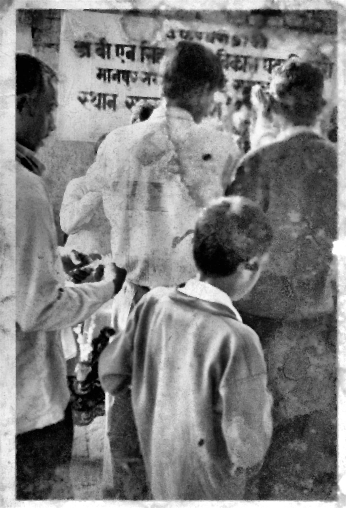 Restored monochrome photograph of a felicitation ceremony at Manpur, Gaya, dated 4 February 1997.